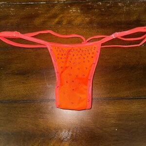 Neon orange thong with rhinestones